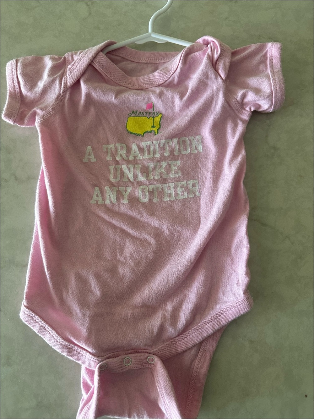 Masters Pink Baby One-Piece Bodysuit with Yellow Logo